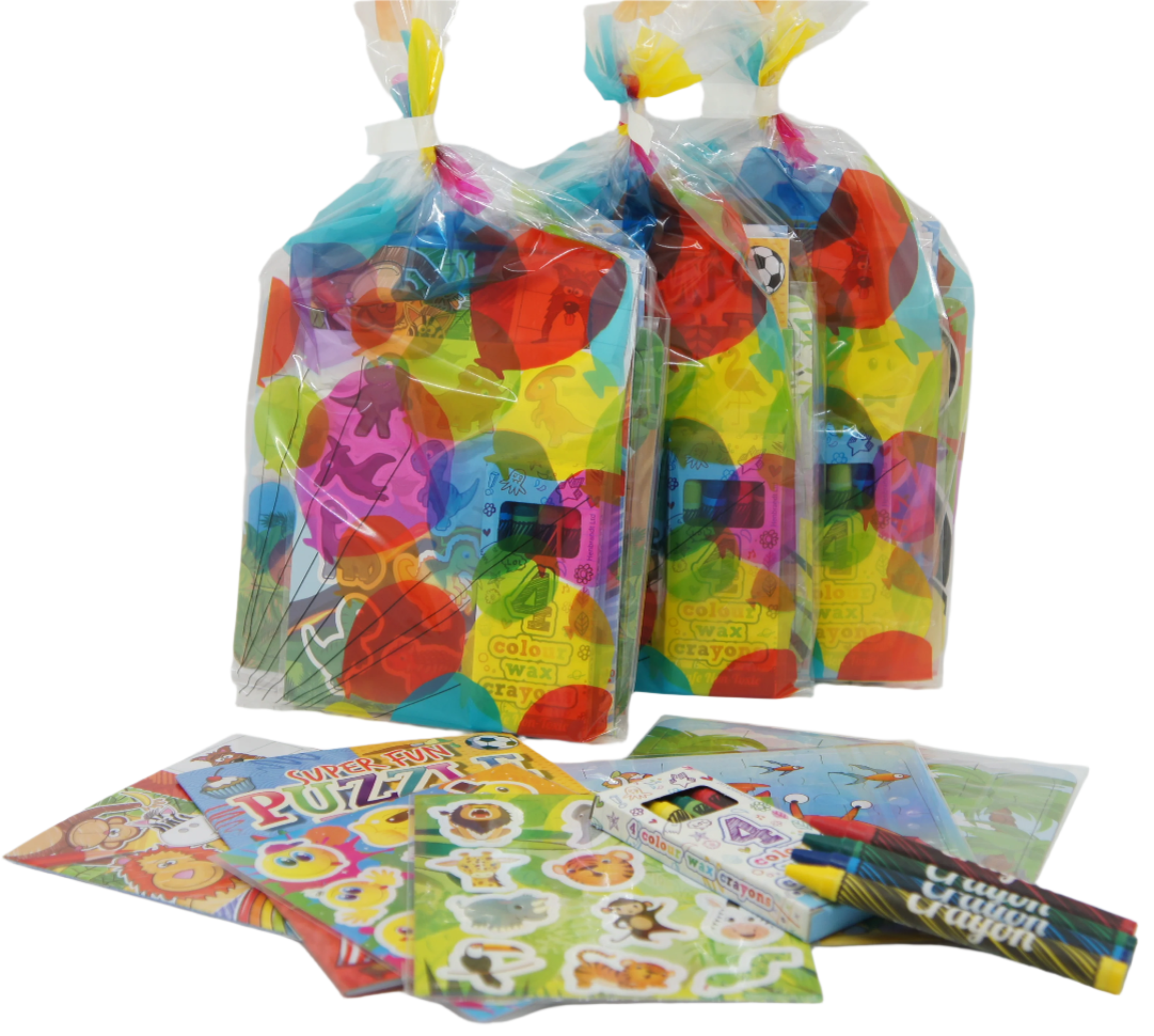 Colorful children's activity packs with puzzles and crayons on a white background